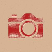 camera halftone stijl icoon met grunge achtergrond vector illustratie