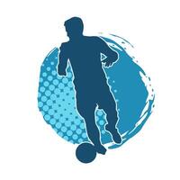 silhouet van een mannetje voetbal speler schoppen een bal. silhouet van een Amerikaans voetbal speler in actie houding. vector