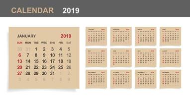 kalender 2019 - set van maandelijkse kalender op bruin papier en witte houten achtergrond. vector. vector