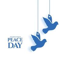 Internationale vrede dag viering poster met hangende duif vogel vector