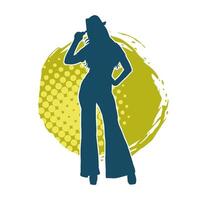 silhouet van een slank vrouw model- vervelend lang broek en fedora hoed in houding. vector