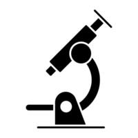 een solide ontwerp icoon van microscoop vector