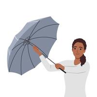 vrouw opening paraplu in regen. herfst of voorjaar seizoen, regenachtig winderig weer vector