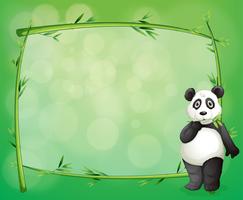 Een panda naast een frame gemaakt van bamboe vector