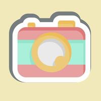 sticker camera. verwant naar vermaak symbool. gemakkelijk ontwerp illustratie vector