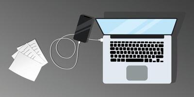 visie van de bureaublad van bovenstaande, werken Aan een laptop, opladen de telefoon, documenten zijn in de buurt. vlak illustratie kantoor in grijs kleuren vector