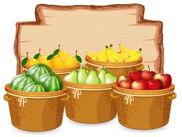 Veel fruit op een houten bord vector