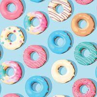 naadloos patroon met hoog gedetailleerd pastel donuts Aan blauw achtergrond vector