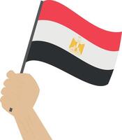 hand- Holding en verhogen de nationaal vlag van Egypte vector