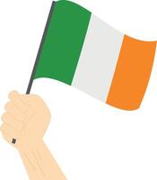 hand- Holding en verhogen de nationaal vlag van Ierland vector