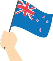hand- Holding en verhogen de nationaal vlag van nieuw Zeeland vector