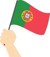 hand- Holding en verhogen de nationaal vlag van Portugal vector