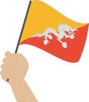 hand- Holding en verhogen de nationaal vlag van Bhutan vector