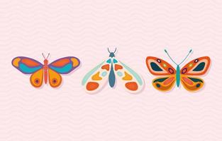 set handgetekende vlinders op een roze achtergrond vector