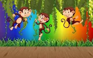 aap die aan liaan hangt op regenbooggradiëntachtergrond