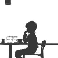 silhouet weinig jongen zittend Bij een tafel in de cafe zwart kleur enkel en alleen vector