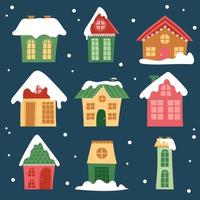 collectie winterhuizen. cartoon sneeuw huis en landelijke huisjes set vector