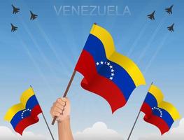 vlaggen van venezuela vliegen onder de blauwe lucht vector