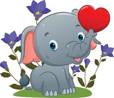 de schattige olifant zit en houdt de liefdesballon met zijn slurf in de tuin vector