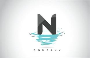 n letter logo-ontwerp met water splash rimpelingen druppels reflectie vector