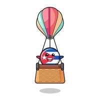 Cubaanse vlagmascotte die een heteluchtballon berijdt vector