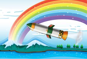 Een regenboog boven de oceaan en een vliegtuig vector