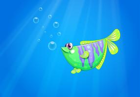 Een groene vis onder de zee vector