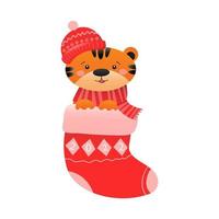 een schattige tijger in een wintermuts en sjaal, zittend in een kerstsok. Kerstmis en Nieuwjaar concept. vector