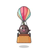 zwarte olijfmascotte rijdt in een heteluchtballon vector