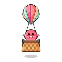 medicijntabletmascotte die een heteluchtballon berijdt vector