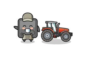 de mascotte van de kluisboer die naast een tractor staat vector