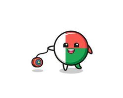 cartoon van de schattige vlag van Madagaskar die een jojo speelt vector