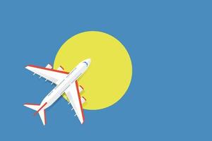vectorillustratie van een passagiersvliegtuig dat over de vlag van palau vliegt. concept van toerisme en reizen vector