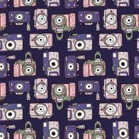 naadloze patroon camera's in doodle op donkere achtergrond. vintage textuur retro camera voor stof met paarse en roze kleuren. moderne hipsterkunst in vlakke stijl. vector