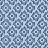 abstracte etnische ikat chevron naadloze patroon. geometrische gestreepte folk sieraad. tribale vector textuur. traditionele achtergrond voor stof in Aziatische landen. tapijt tapijt imitatie.