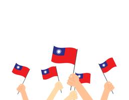 Vectorillustratiehands die de vlaggen van Taiwan op witte achtergrond houden vector