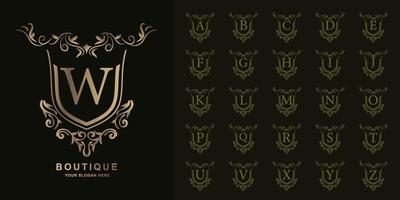 letter w of collectie eerste alfabet met luxe sieraad bloemen frame gouden logo sjabloon. vector