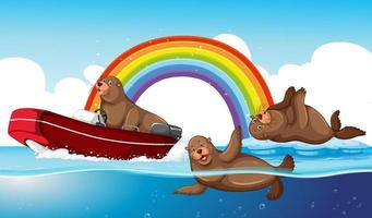 zeeleeuwen dierlijk beeldverhaal in het water met regenboog vector