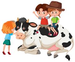 Kinderen en koe op witte achtergrond vector
