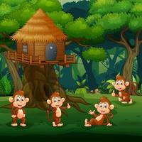 scène met een groep apen die speelt in de boomhut vector