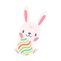 een klein konijntje springt uit een kleurrijk paasei. cartoon decoratieve kaart voor kinderen vector