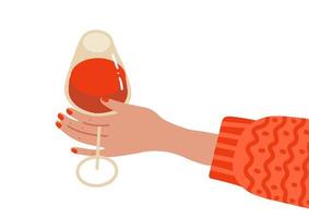 vrouw s hand met een glas met rode wijn. gezellig winter geïsoleerd element. arm in warme gebreide trui. vector platte hand getekende illustratie