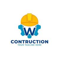 beginletter w met uitrusting en helm. constructie en engineering logo concept vector