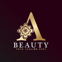 elegant een luxe logo. gouden bloemen alfabet logo met bloemen bladeren. perfect voor mode, sieraden, schoonheidssalon, cosmetica, spa, boetiek, bruiloft, postzegel, hotel- en restaurantlogo. vector