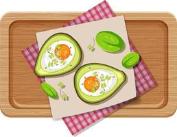 bovenaanzicht eten romig avocado-ei bakken met placemat op houten plaat op witte achtergrond