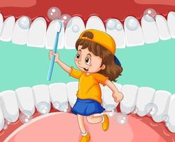 een klein meisje dat een tandenborstel in de menselijke mond houdt vector