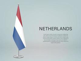 nederland hangende vlag op standaard. sjabloon voor conferentiebanner vector