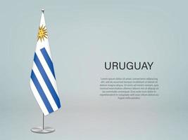 uruguay hangende vlag op standaard. sjabloon voor conferentiebanner vector