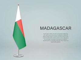 Madagaskar hangende vlag op standaard. sjabloon voor conferentiebanner vector