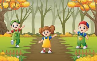 gelukkige kinderen die in de tuin spelen illustratie vector
